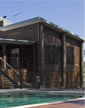Thumbnail of outside side view of Pole home featuring external exposed pole around home and verandah