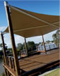 Thumbnail of view from the grass of the Brolga Deck and the 6 poles that support the sail