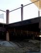 Thumbnail of underneath the deck showcasing the poles and the construction