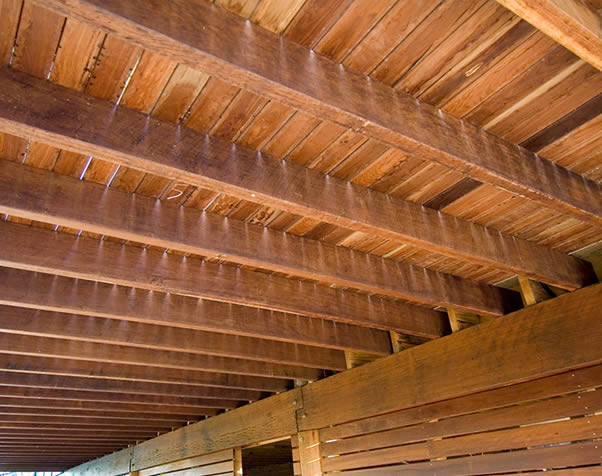 Large image of Underneath a deck showing the hardwood structural joists